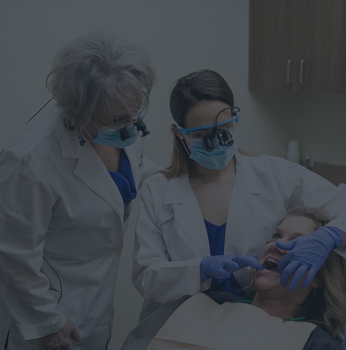Rockwall dentists examining the mouth of a dental patient